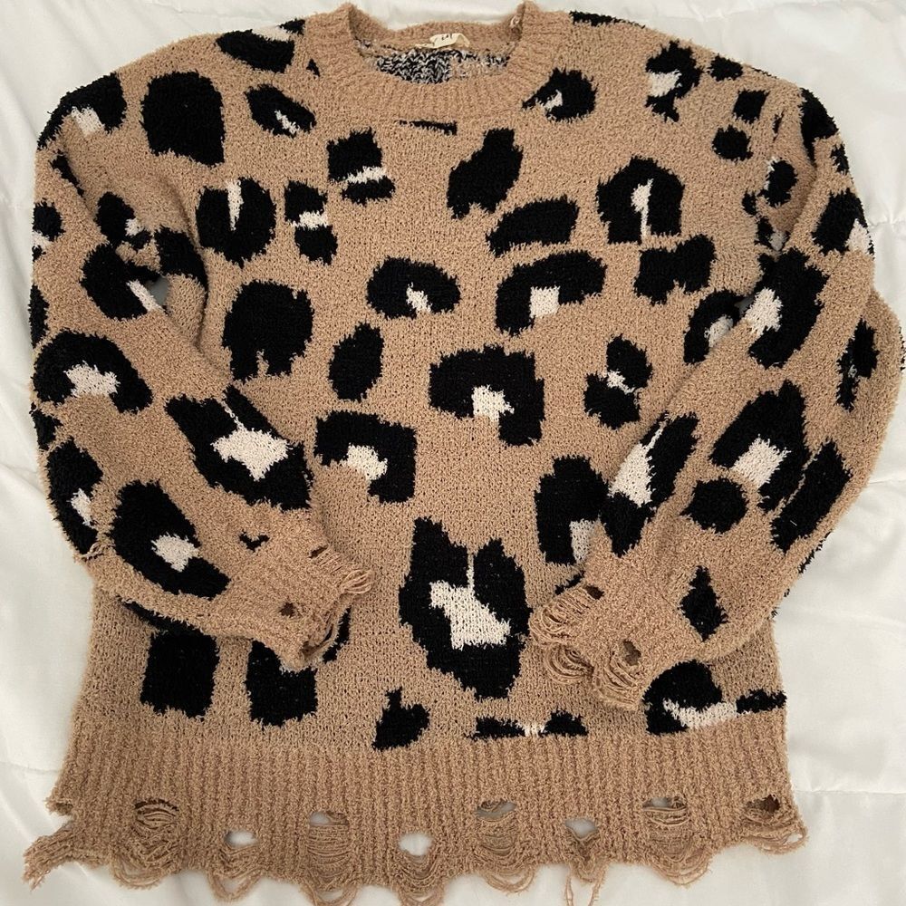 Distressed leopard sweater size small